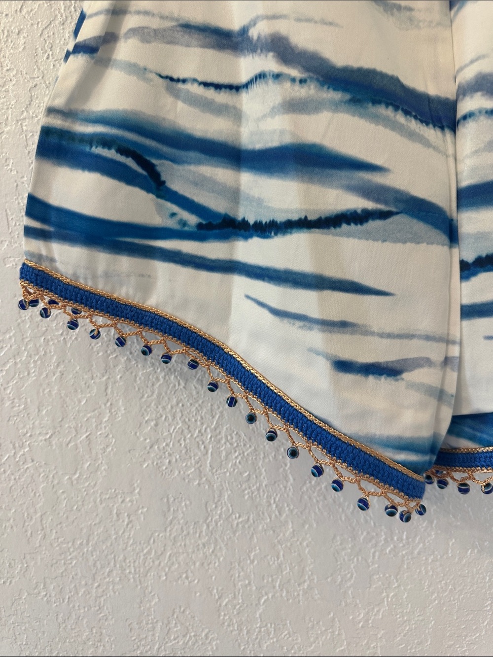 High-Waist Blue Wave Print Women's Shorts with Beaded Evil Eye Tassel Hem - Picture 9 of 10